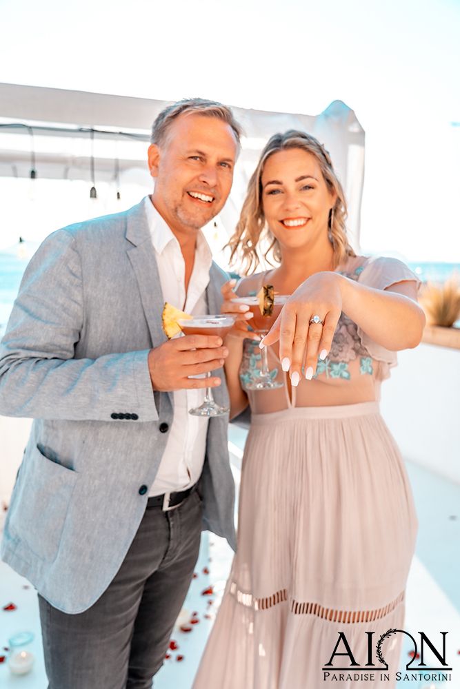 A standing toast with cocktails on the terrace