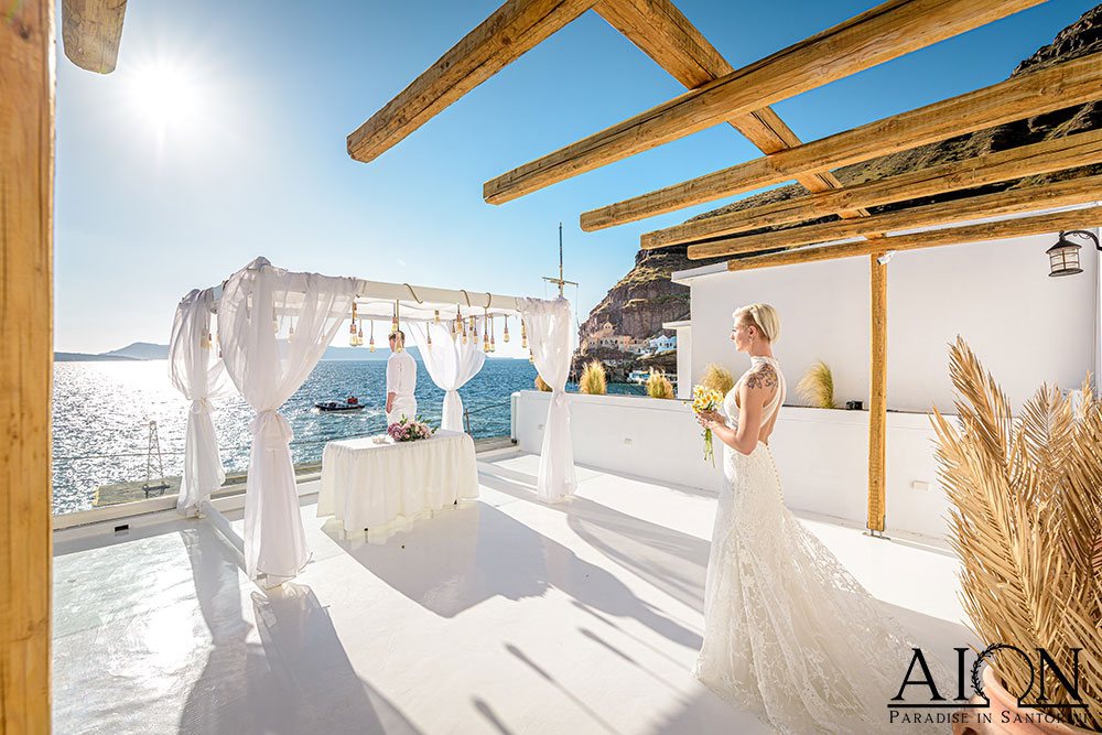 Grace and Brennan exchanging vows on the terrace at AION
