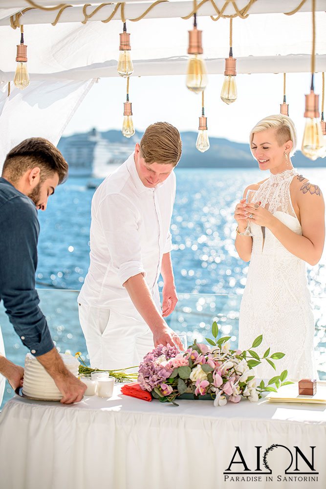 Grace and Brennan, portrait on the terrace at AION Santorini