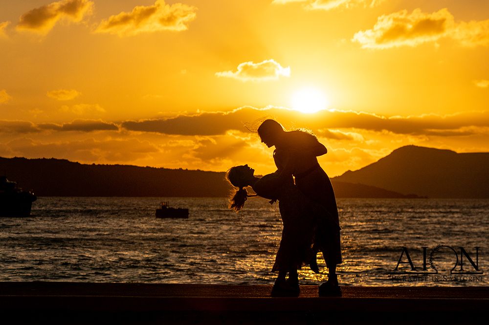A silhouetted lift against the setting sun during the post-proposal photoshoot