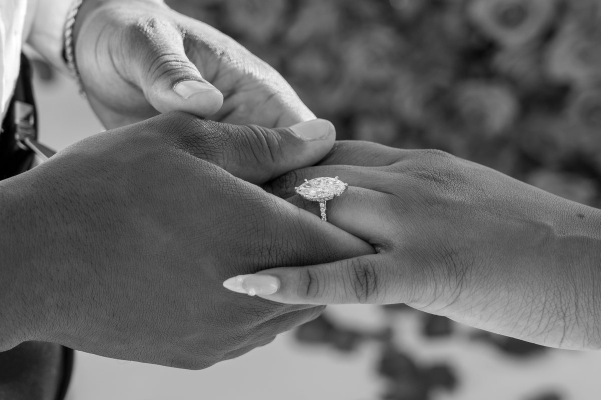 A close detail of the new engagement ring, minutes after a proposal at AION Santorini